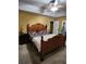 Primary bedroom suite with an oak bedroom set and neutral paint at 645 Birchberry Sw Ter, Atlanta, GA 30331