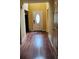 Open hallway with natural light and wood flooring at 645 Birchberry Sw Ter, Atlanta, GA 30331
