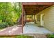 Inviting backyard patio featuring a deck and stairs with lush green landscaping at 2810 Stillwater Park Dr, Marietta, GA 30066