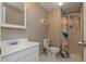 This bathroom features a white sink, toilet, and shower at 2810 Stillwater Park Dr, Marietta, GA 30066