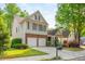 A lovely home with a well-kept lawn, lush greenery, and a charming mailbox at 2810 Stillwater Park Dr, Marietta, GA 30066
