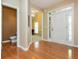 Bright foyer features hardwood floors, chandelier, and half bathroom at 2810 Stillwater Park Dr, Marietta, GA 30066