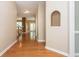 Welcoming hallway with gleaming hardwood floors and staircase views at 2810 Stillwater Park Dr, Marietta, GA 30066
