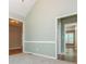 The living room has neutral walls and trim with open doorways to other rooms at 2810 Stillwater Park Dr, Marietta, GA 30066