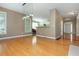 Bright and open floor plan with hardwood floors, kitchen view, and ample natural light, ideal for entertaining at 2810 Stillwater Park Dr, Marietta, GA 30066