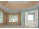 Spacious main bedroom with a tray ceiling and an ensuite bathroom at 2810 Stillwater Park Dr, Marietta, GA 30066