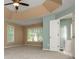 Main bedroom featuring a tray ceiling and an ensuite bathroom at 2810 Stillwater Park Dr, Marietta, GA 30066