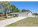Lovely single-story home featuring an attached garage, driveway, and manicured lawn at 3998 Wabash Ln, Ellenwood, GA 30294