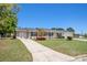 Charming single-story home with a well-manicured lawn and inviting curb appeal at 3998 Wabash Ln, Ellenwood, GA 30294