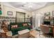 Inviting living room featuring comfortable seating, desk and natural light at 3998 Wabash Ln, Ellenwood, GA 30294