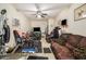 Large, well-lit living room equipped with comfortable seating and multiple entertainment options at 3998 Wabash Ln, Ellenwood, GA 30294