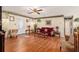 Cozy living room with hardwood floors, charming furnishings and lots of natural light at 3998 Wabash Ln, Ellenwood, GA 30294