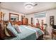 Spacious bedroom with comfortable bed, detailed wall decor, and lots of natural light at 3998 Wabash Ln, Ellenwood, GA 30294