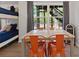 Bedroom dining nook is lit by a hanging chandelier and natural light at 826 Buffington Way, Canton, GA 30115
