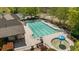 Community pool featuring lap lanes, a mushroom fountain and covered seating area for residents at 826 Buffington Way, Canton, GA 30115