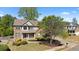 Lovely two-story home featuring a well-manicured front lawn and inviting entryway with colorful shrubs at 826 Buffington Way, Canton, GA 30115