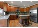 Well-designed kitchen with wood cabinets, stainless appliances, and a convenient center island at 826 Buffington Way, Canton, GA 30115