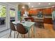 Kitchen with custom cabinets, an island and a view to the outdoor deck at 826 Buffington Way, Canton, GA 30115
