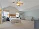 Expansive main bedroom features a high ceiling, sitting area, ceiling fan, and neutral color scheme at 826 Buffington Way, Canton, GA 30115