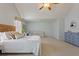 Spacious main bedroom with sitting area, carpeted floors, neutral paint, and lots of natural light at 826 Buffington Way, Canton, GA 30115