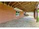 Stone patio under deck offers outdoor living space at 1740 Manhasset Pl, Atlanta, GA 30338