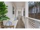 Charming balcony with a cushioned bench, overlooking scenic woods, providing a tranquil outdoor retreat at 200 Pinecone Pl, Alpharetta, GA 30022