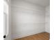 Walk in closet with wood flooring and white wire shelving at 200 Pinecone Pl, Alpharetta, GA 30022
