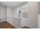 Hallway with hardwood floors, and natural light at 200 Pinecone Pl, Alpharetta, GA 30022