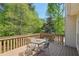 Back deck with chairs overlooking the trees at 2545 Amberbrook Ln, Grayson, GA 30017