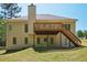 Inviting two-story home featuring a spacious deck, walkout basement, and well-maintained backyard at 2545 Amberbrook Ln, Grayson, GA 30017