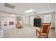 Spacious finished basement with recessed lighting, rocking chairs, and ample room at 2545 Amberbrook Ln, Grayson, GA 30017