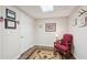 Cozy basement room with wood-look floors and patriotic decor at 2545 Amberbrook Ln, Grayson, GA 30017