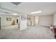 Expansive basement area with multiple rooms and neutral carpeting at 2545 Amberbrook Ln, Grayson, GA 30017