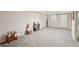 Basement playroom area featuring neutral carpeting and a walkout door at 2545 Amberbrook Ln, Grayson, GA 30017