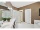 Spacious bathroom with a large mirror over the double sink and glass enclosed shower at 2545 Amberbrook Ln, Grayson, GA 30017
