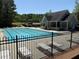 Inviting community pool with lounge chairs and covered seating area, perfect for relaxation and enjoying sunny days at 2545 Amberbrook Ln, Grayson, GA 30017