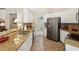Kitchen with stainless steel appliances, granite countertops, and white cabinetry at 2545 Amberbrook Ln, Grayson, GA 30017