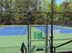 Close-up of the community tennis court entrance showing the court rules at 2545 Amberbrook Ln, Grayson, GA 30017