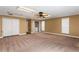 Bonus room featuring a closet, multiple windows, and neutral carpet at 65 Woodside Ct, Mcdonough, GA 30253
