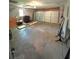 Spacious garage with ample storage space, a large mirror and a two-car door at 1228 Reilly Ln, Clarkston, GA 30021
