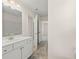 This bathroom features a vanity with a sink and a doorway to a bedroom at 13579 Whitman Ln, Covington, GA 30014