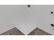 This laundry room features tile flooring and a washing machine hook up at 13579 Whitman Ln, Covington, GA 30014