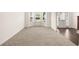Inviting living room with a bay window and new carpeting at 13579 Whitman Ln, Covington, GA 30014