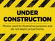 Warning sign that the building is under construction and photos used for illustrative purposes at 13579 Whitman Ln, Covington, GA 30014