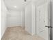 Spacious walk-in closet with custom shelving at 13579 Whitman Ln, Covington, GA 30014