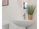 Modern bathroom with a unique round sink, stylish faucet, and decorative plant at 2718 Byess Ct, Marietta, GA 30064