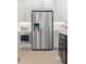 Gourmet kitchen with stainless steel refrigerator and matching microwave appliance at 2718 Byess Ct, Marietta, GA 30064