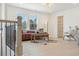 Bright and open living space with a stylish sofa, decor, and view outside at 2718 Byess Ct, Marietta, GA 30064