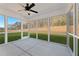 Screened in porch with multiple large windows providing panoramic outdoor views at 2718 Byess Ct, Marietta, GA 30064