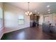Inviting dining area with hardwood floors and natural light at 10 Edgewater Ct, Covington, GA 30016
